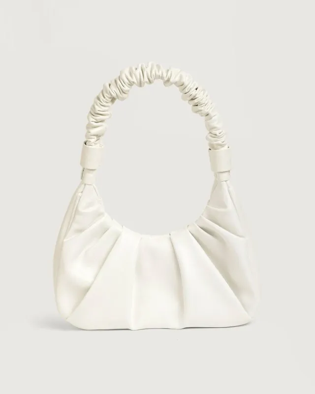 The Minimalist Ruched Leather Handbag sold by rihoas