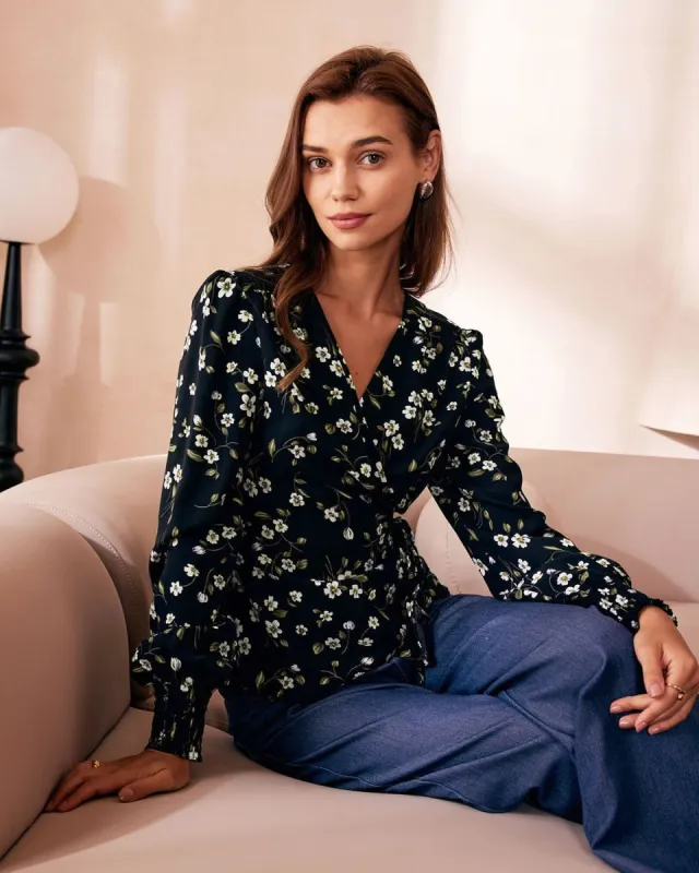 The Black V Neck Floral Shirred Wrap Blouse sold by rihoas