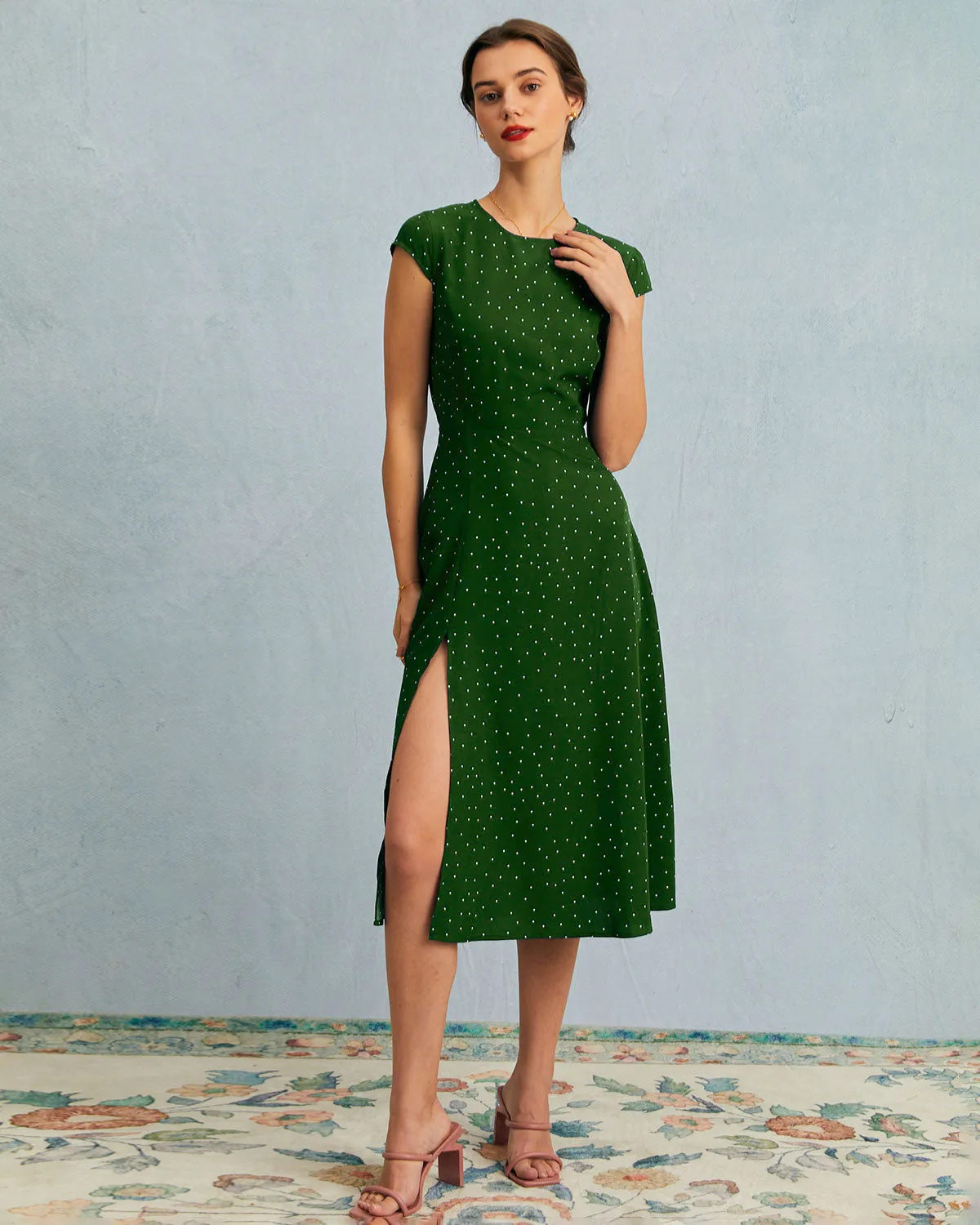 The Green Round Neck Polka Dot Cutout Midi Dress sold by rihoas