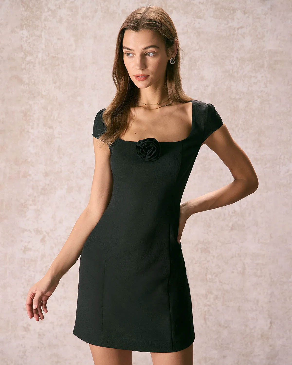 The Black Square Neck Rosette Mini Dress sold by rihoas product image thumbnail 4