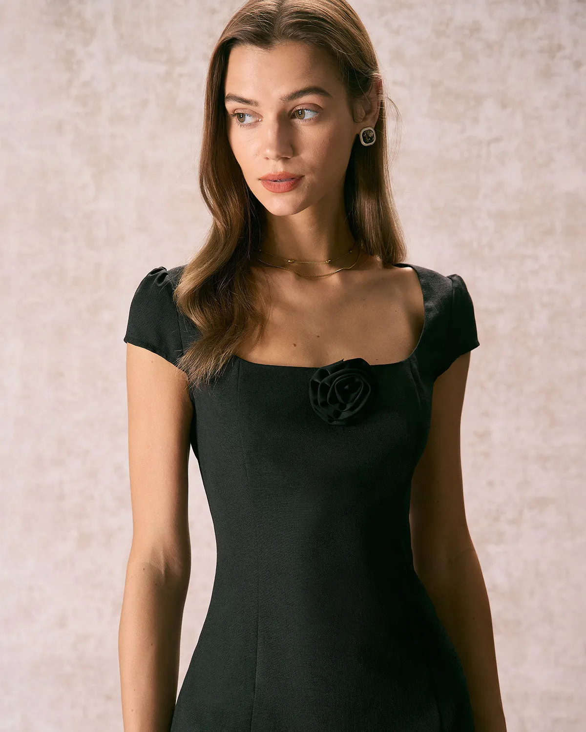 The Black Square Neck Rosette Mini Dress sold by rihoas product image thumbnail 2