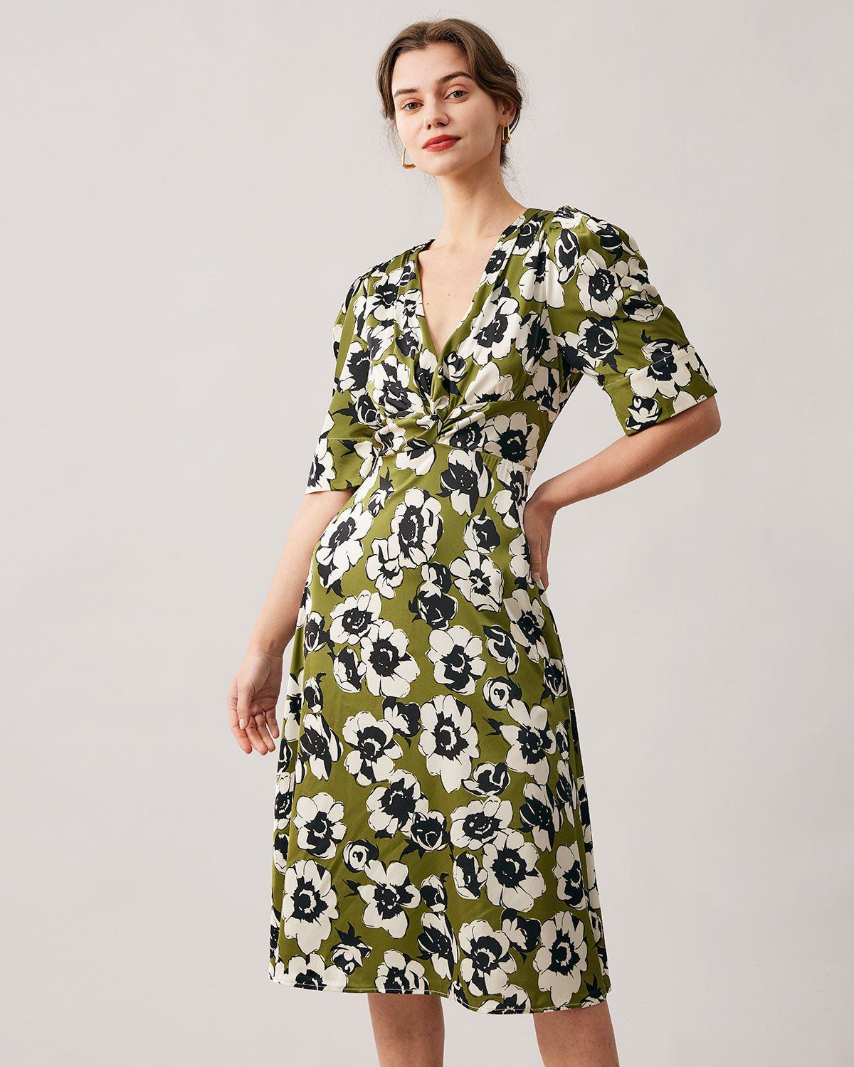 The Green V Neck Puff Sleeve Floral Midi Dress sold by rihoas