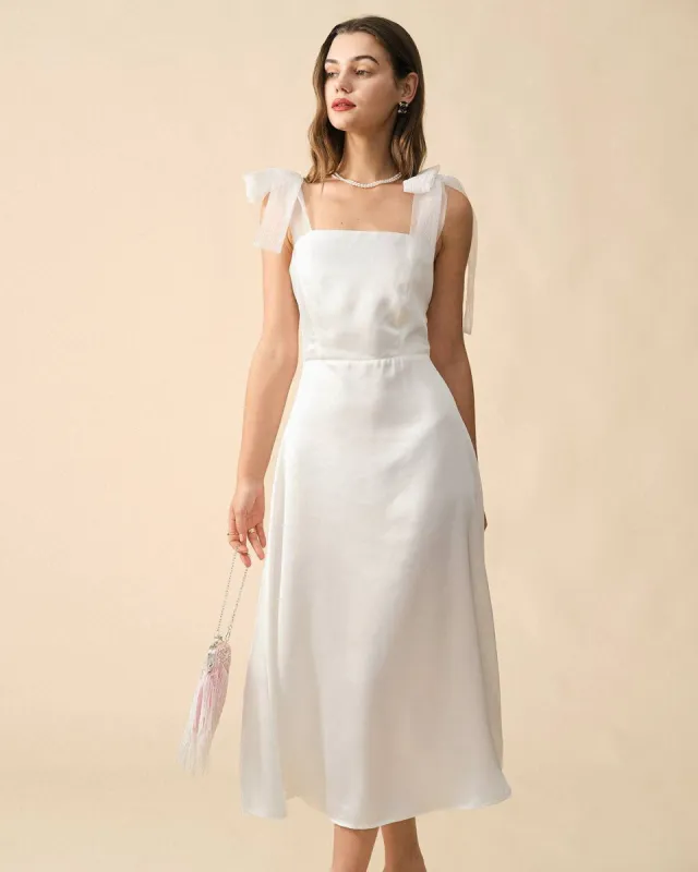 The Solid Color Tie Strap Maxi Dress sold by rihoas