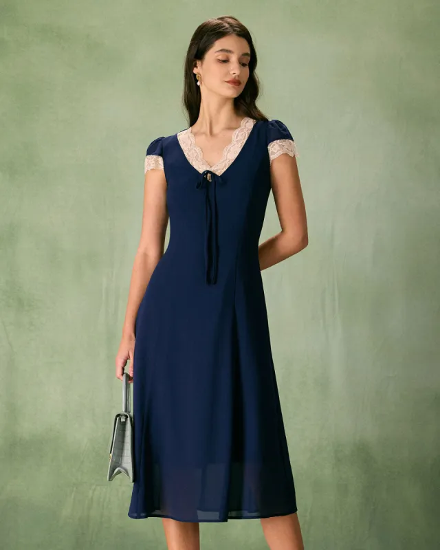 The Navy V-Neck Lace Trim Midi Dress sold by rihoas