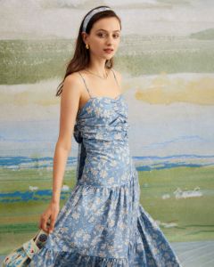 The Blue Floral Ruched Backless Maxi Dress sold by rihoas