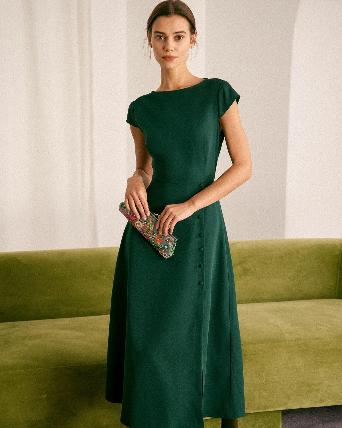 The Green Boat Neck Cutout Back Midi Dress sold by rihoas