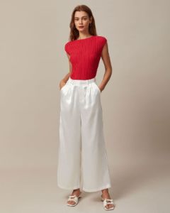 The White High Waisted Satin Wide Leg Pants sold by rihoas