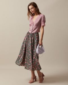 The Pink High Waisted Pleated Floral Midi Skirt sold by rihoas