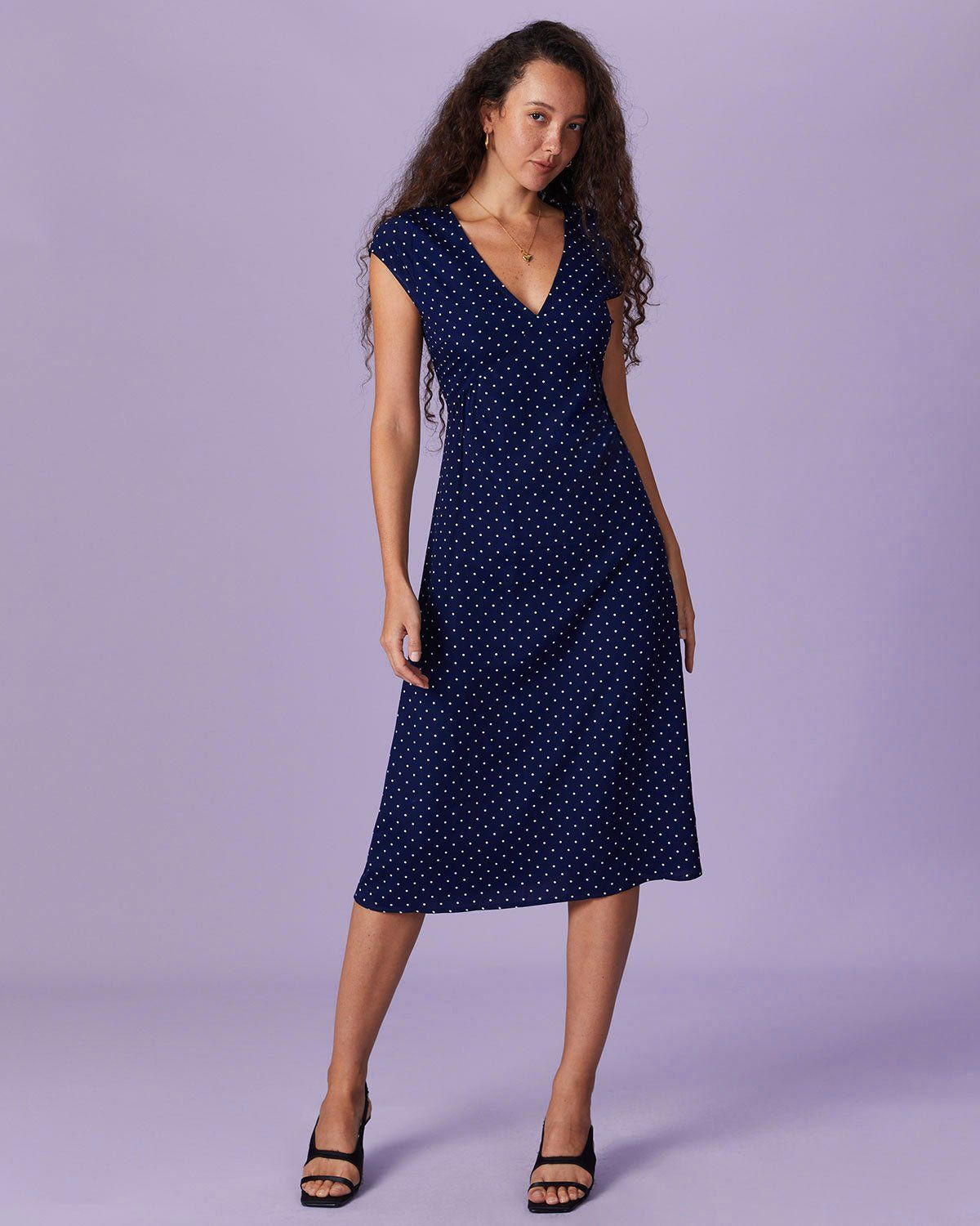The Navy V Neck Polka Dot Ruched Midi Dress sold by rihoas product image thumbnail 2