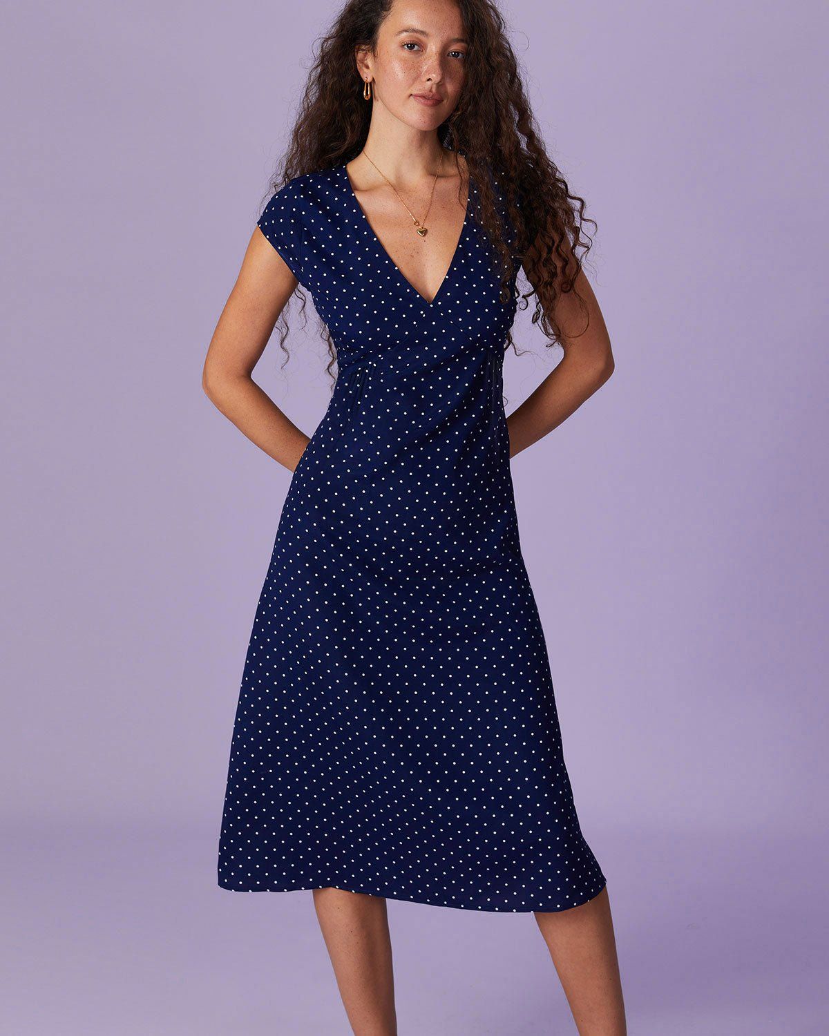 The Navy V Neck Polka Dot Ruched Midi Dress sold by rihoas product image thumbnail 3