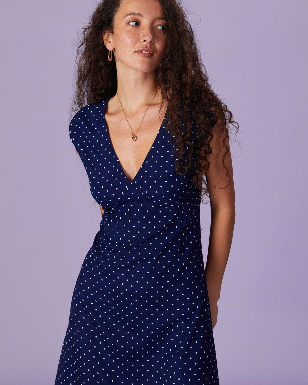 The Navy V Neck Polka Dot Ruched Midi Dress sold by rihoas product image thumbnail 4