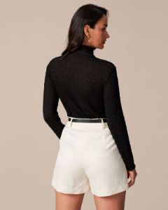 The Black High Neck Button Textured Knit Top sold by rihoas