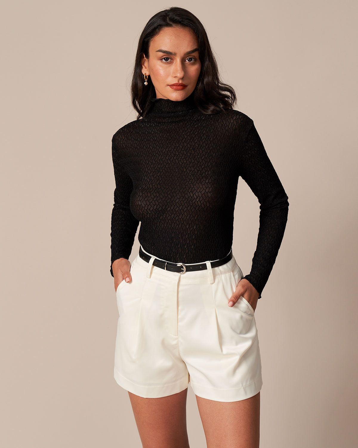 The Black High Neck Button Textured Knit Top sold by rihoas