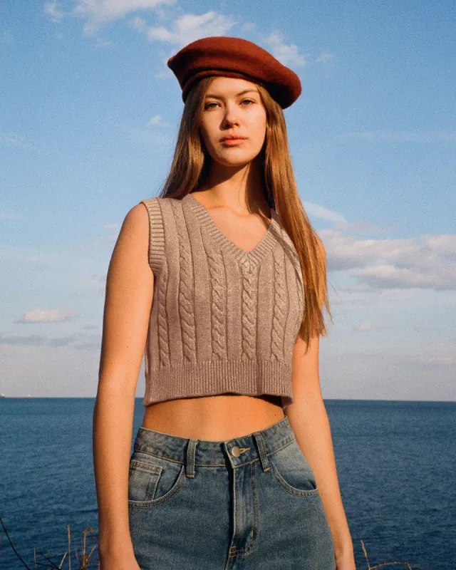 The Apricot Cable Knit V Neck Vest sold by rihoas