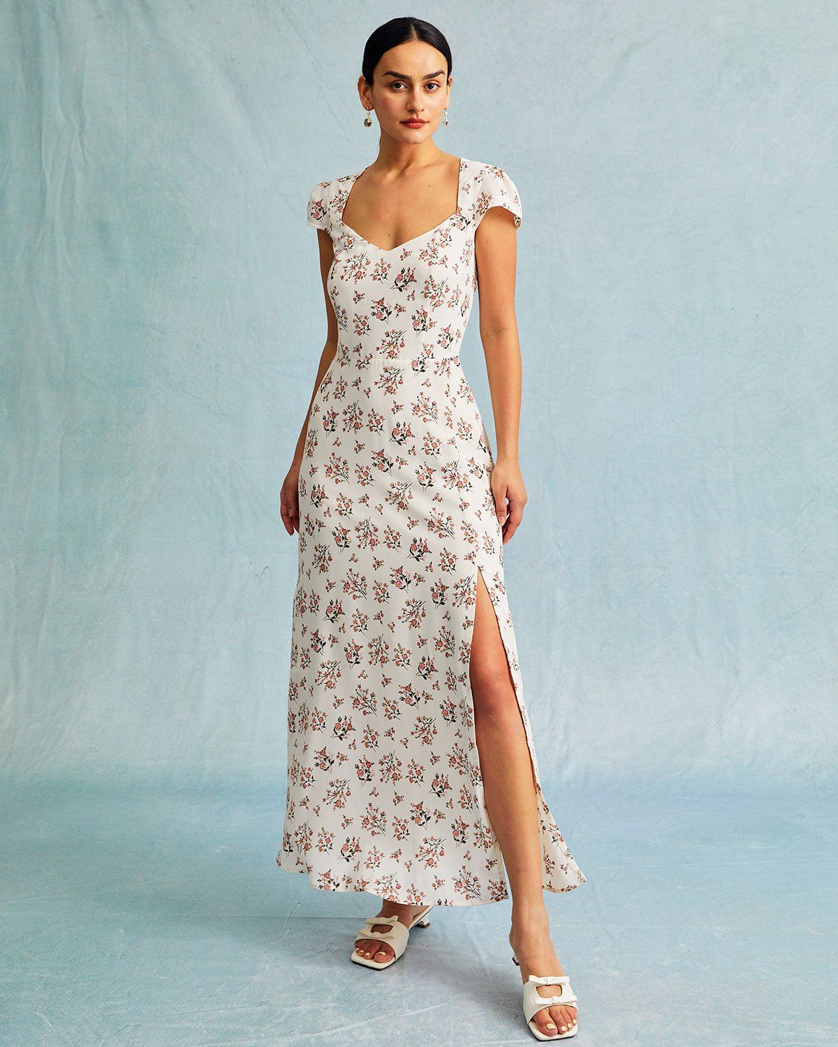 The Apricot Floral Cutout Back Cap Sleeve Maxi Dress sold by rihoas