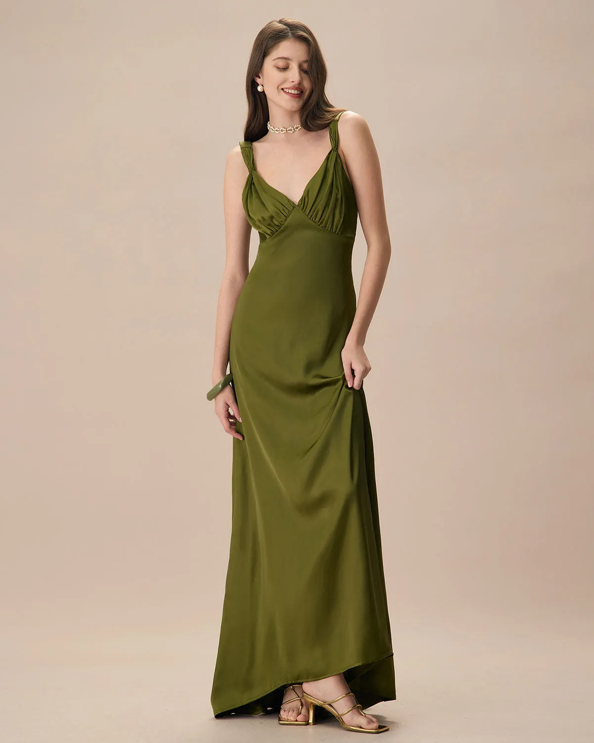 The Green V Neck Ruched Satin Maxi Dress sold by rihoas