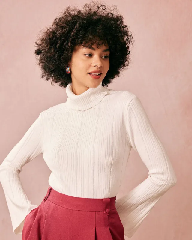 The White Turtleneck Flare Sleeve Knit Top sold by rihoas