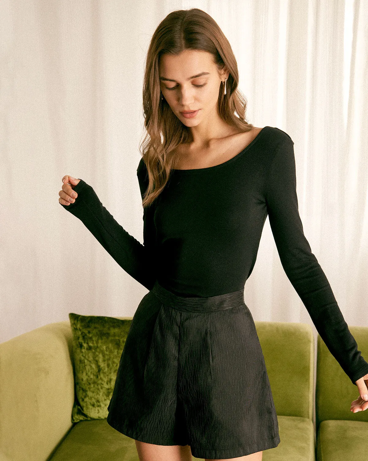 The Black Round Neck Crossover Back Tee sold by rihoas