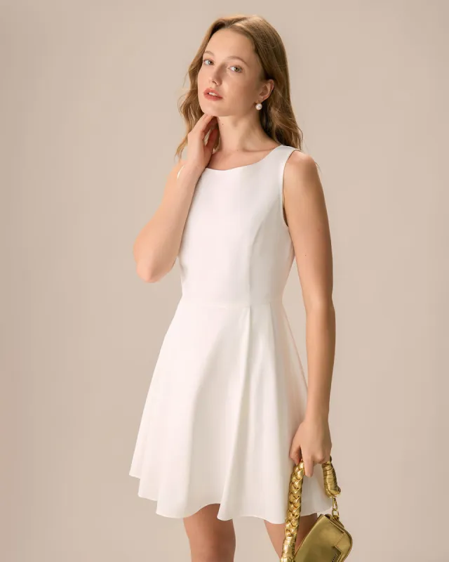 The White Round Neck Pleated Mini Dress sold by rihoas