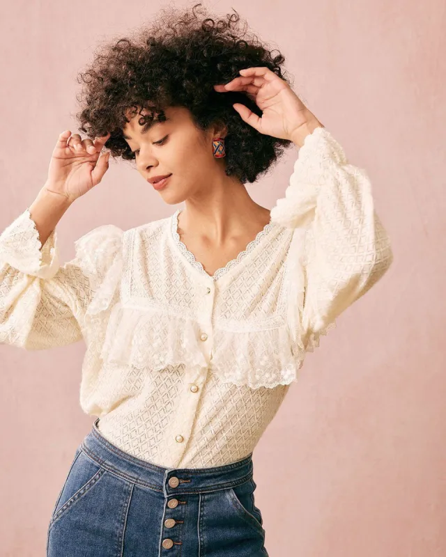 The Beige V Neck Lace Long Sleeve Blouse sold by rihoas