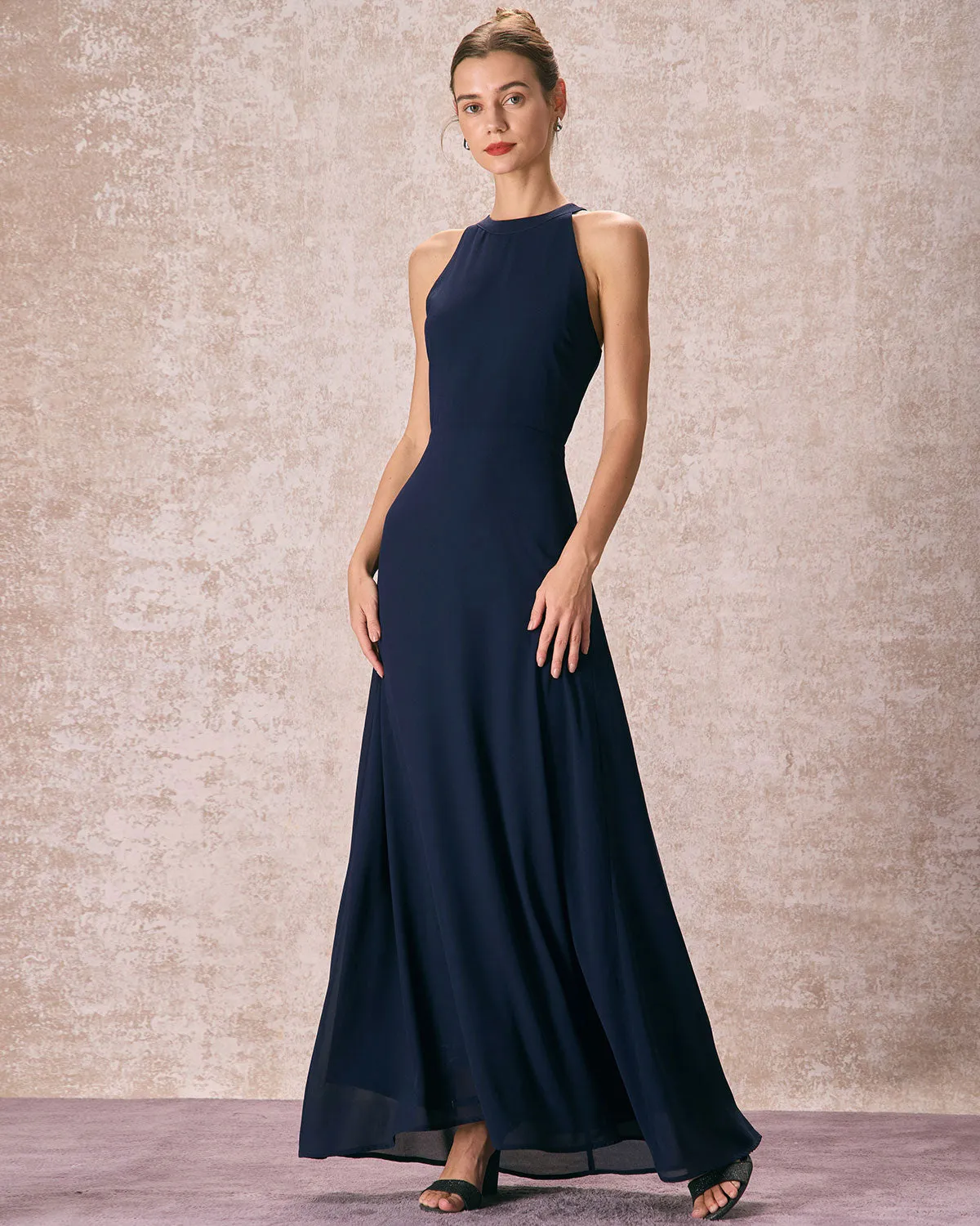 The Navy Halter Bowknot Back Maxi Dress sold by rihoas
