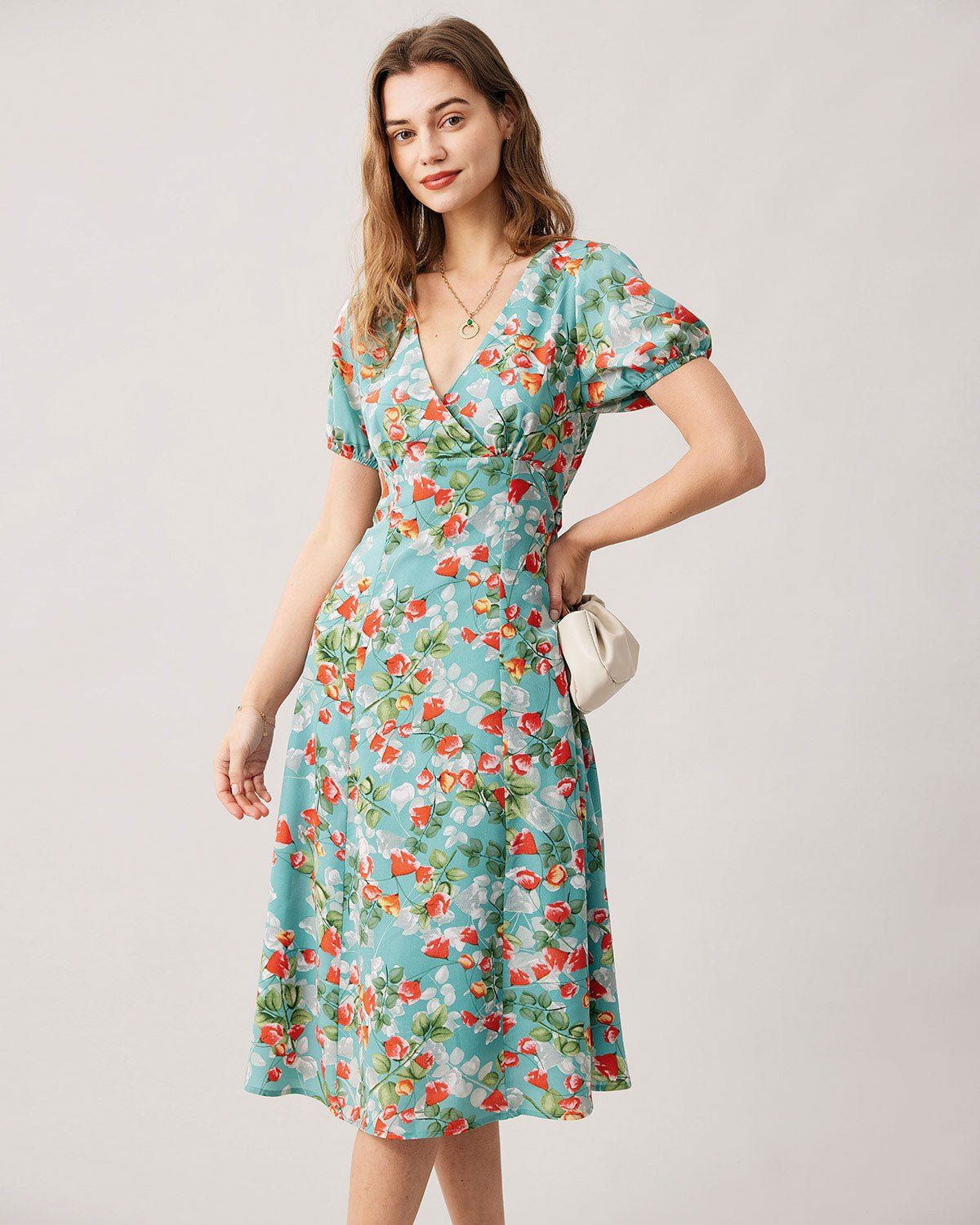 The Green V-Neck Tie Back Floral Midi Dress sold by rihoas
