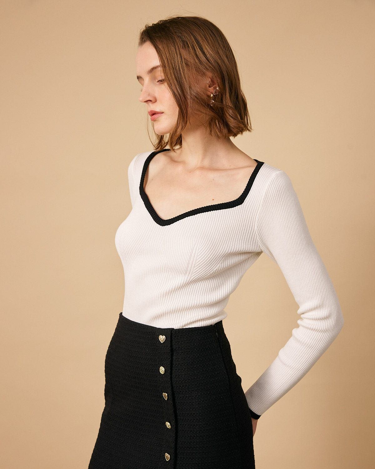 The Contrasting Sweetheart Neck Ribbed Knit Top sold by rihoas
