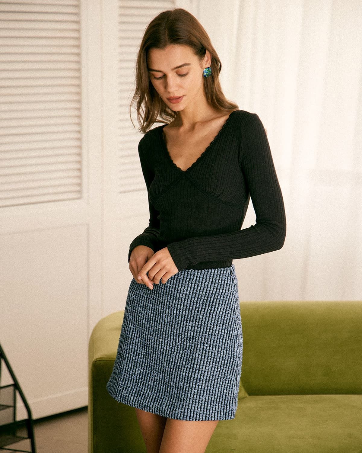 The Black V-Neck Lace Trim Ribbed Knit Top sold by rihoas