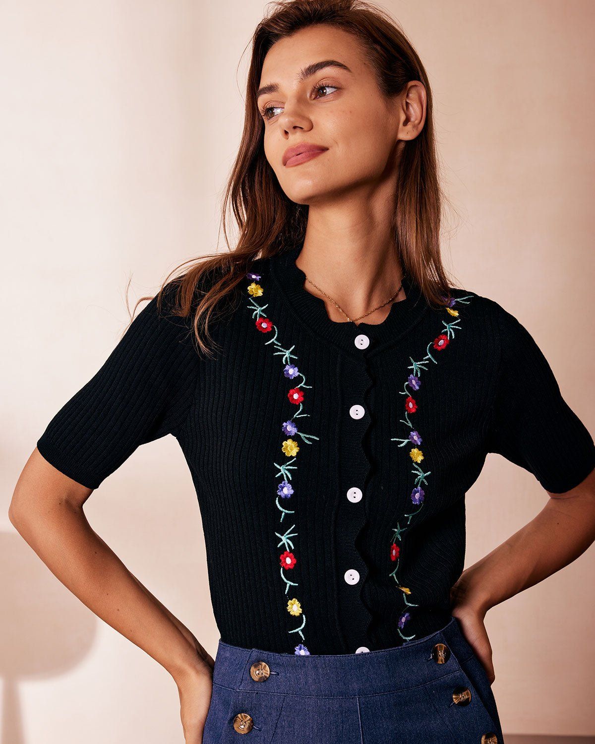 The Black Floral Embroidery Ribbed Knit Tee sold by rihoas