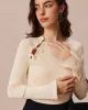 The Beige Ribbed Cut Out Bowknot Knit Top sold by rihoas