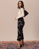 The Beige Ribbed Cut Out Bowknot Knit Top sold by rihoas