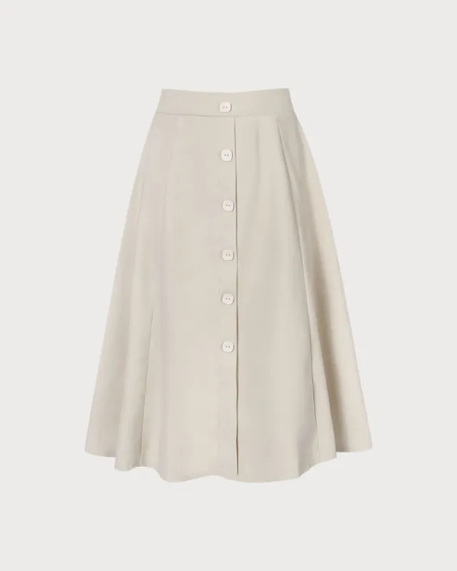 The Beige High Waisted Elastic Button Skirt sold by rihoas