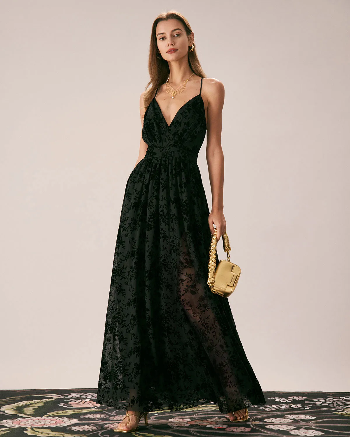 The Black Floral Flocked Mesh Slit Maxi Dress sold by rihoas