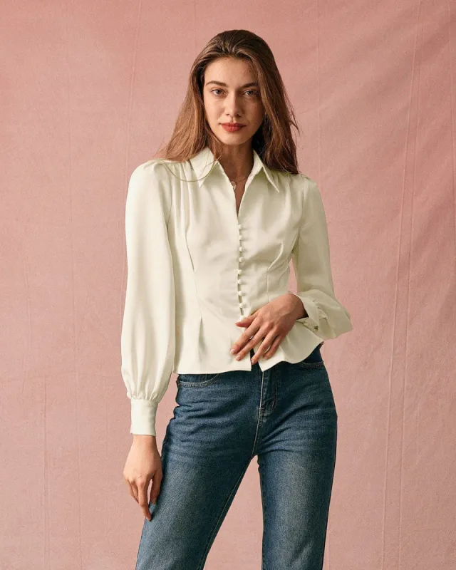The Solid Collared Puff Sleeve Satin Blouse sold by rihoas