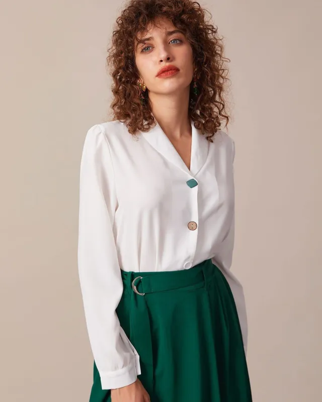 The White Lapel Button Long Sleeve Blouse sold by rihoas