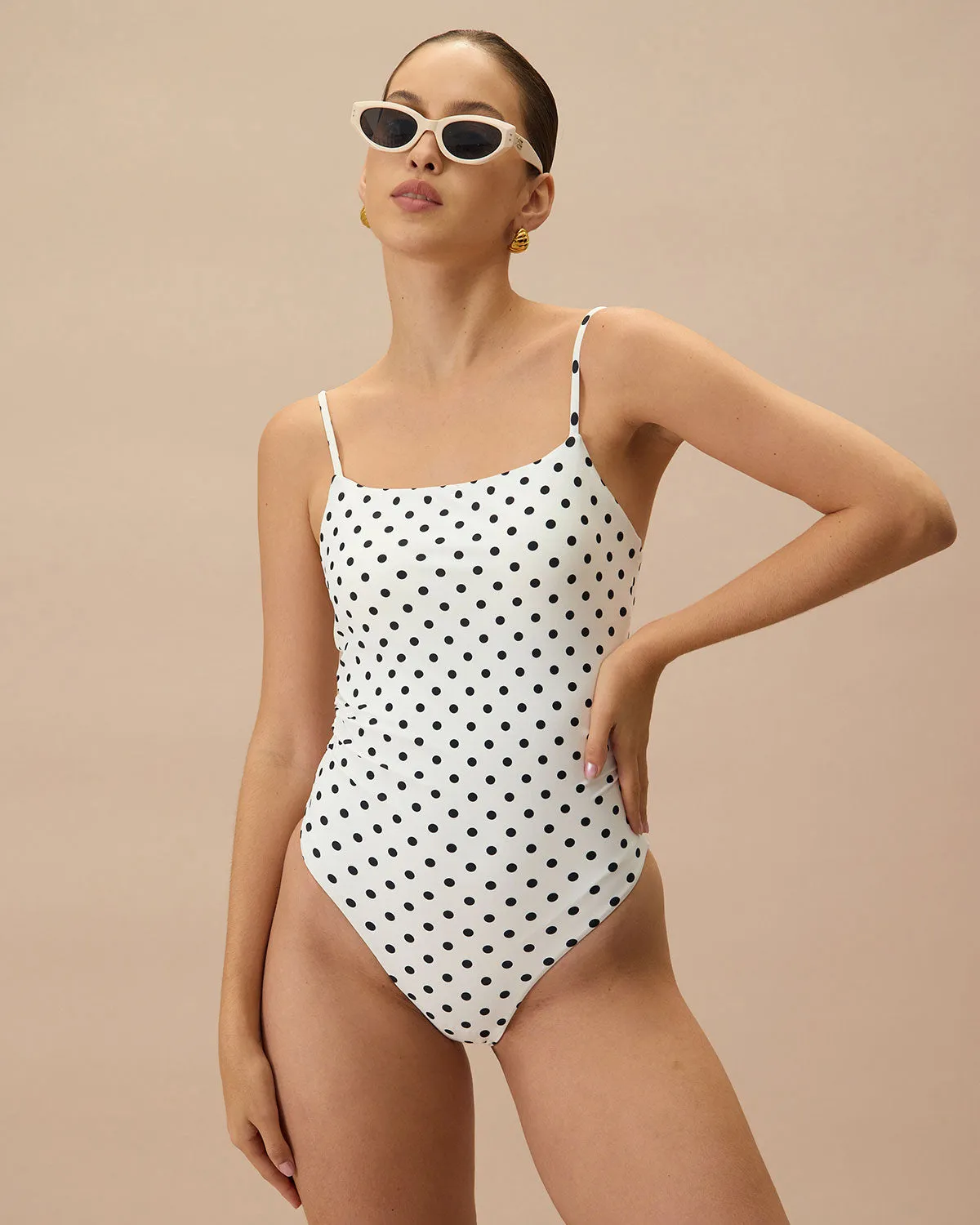 The White Polka Dot Backless One-Piece Swimsuit sold by rihoas