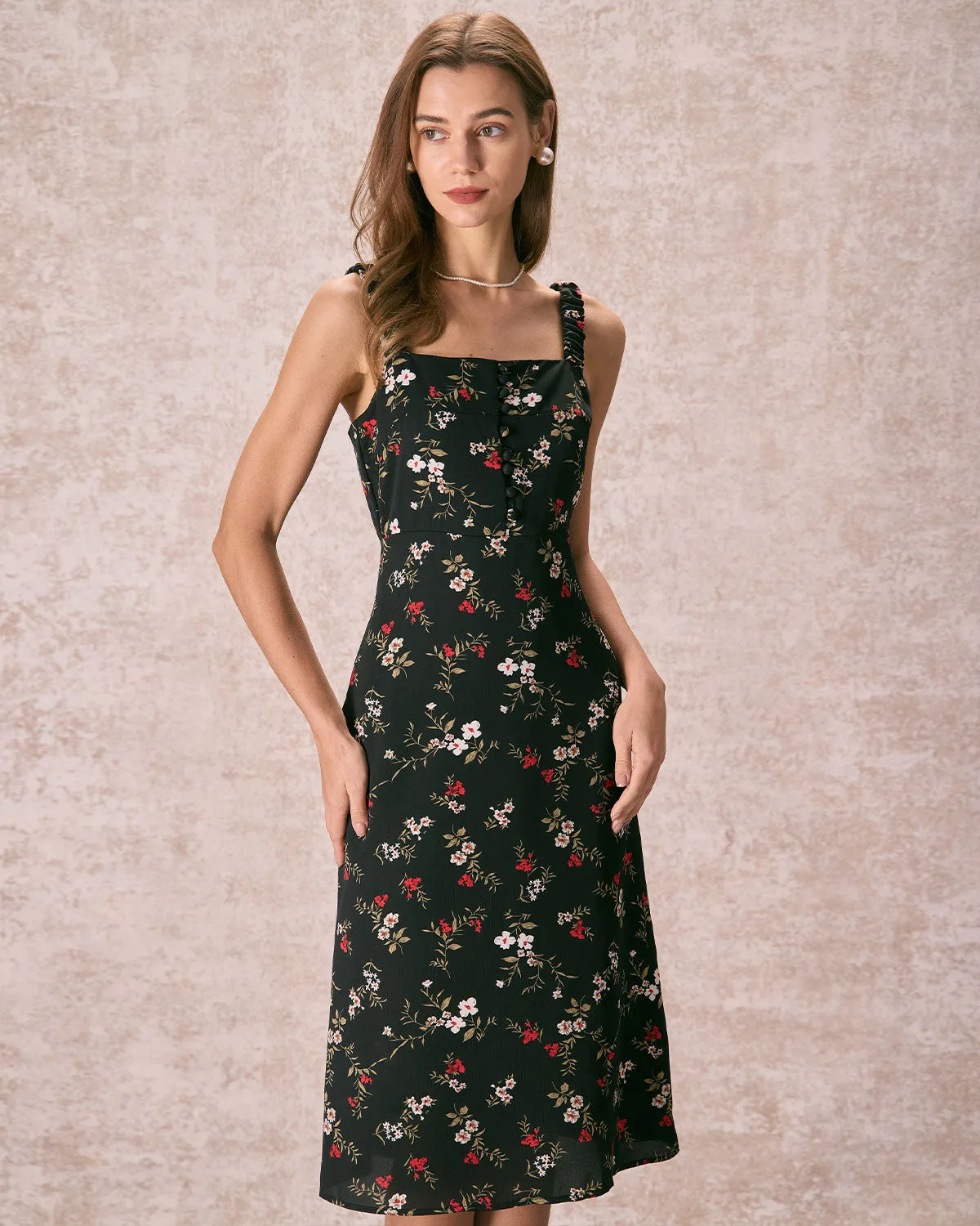 The Black Elasticized Straps Floral Midi Dress sold by rihoas