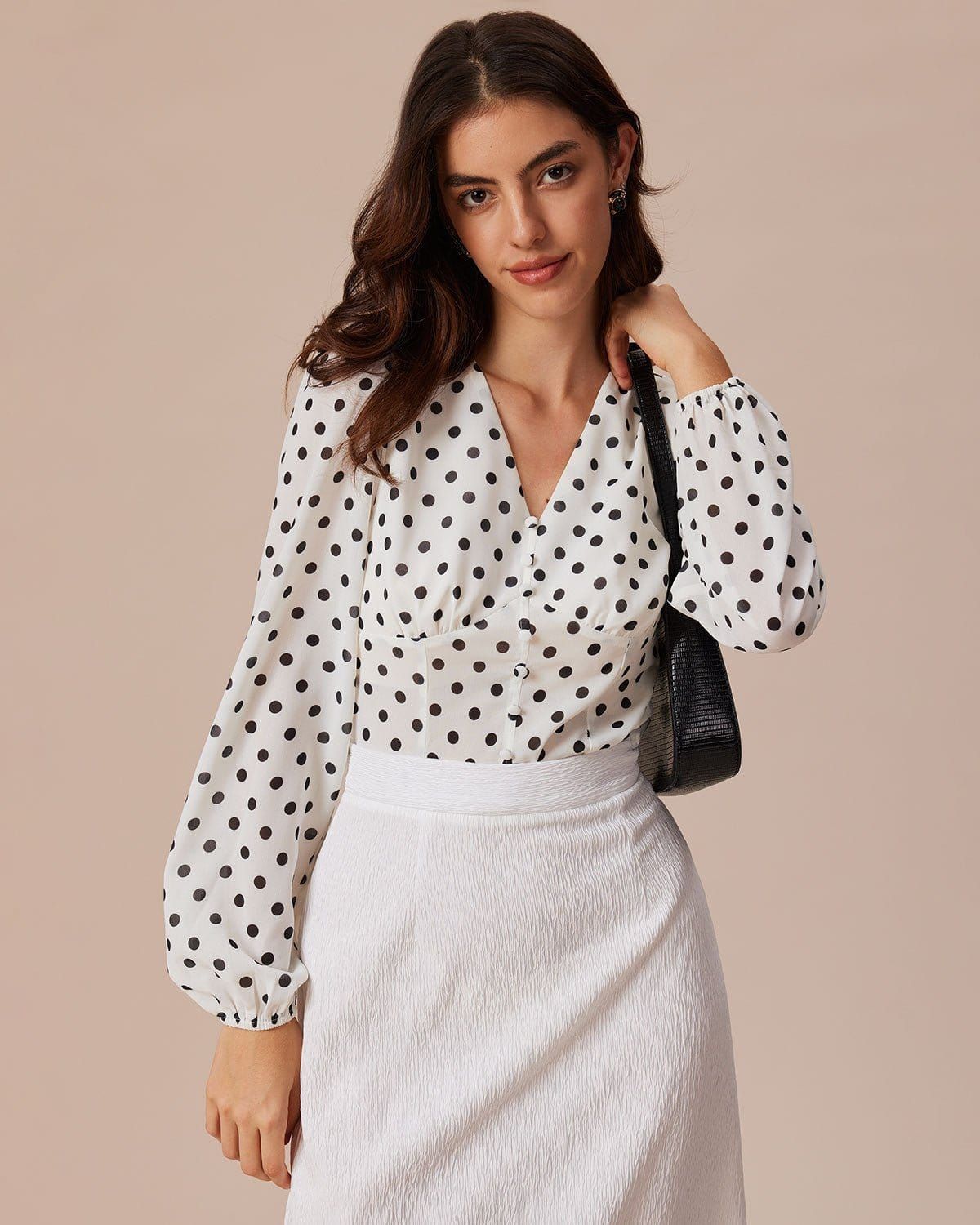 The White V Neck Polka Dot Lantern Sleeve Blouse sold by rihoas