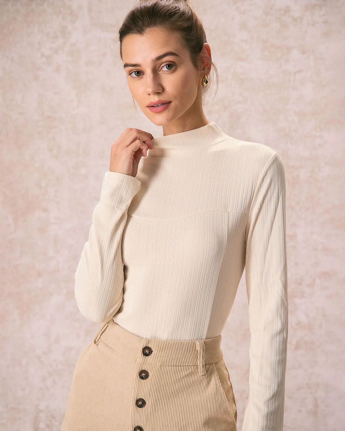 The Beige Mock Neck Ribbed Fitted Tee sold by rihoas