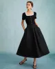 The Black High Waisted Pleated Midi Skirt sold by rihoas