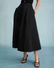 The Black High Waisted Pleated Midi Skirt sold by rihoas