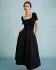 The Black High Waisted Pleated Midi Skirt sold by rihoas