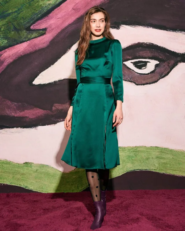 The Cutout Back Satin Long Sleeve Midi Dress sold by rihoas