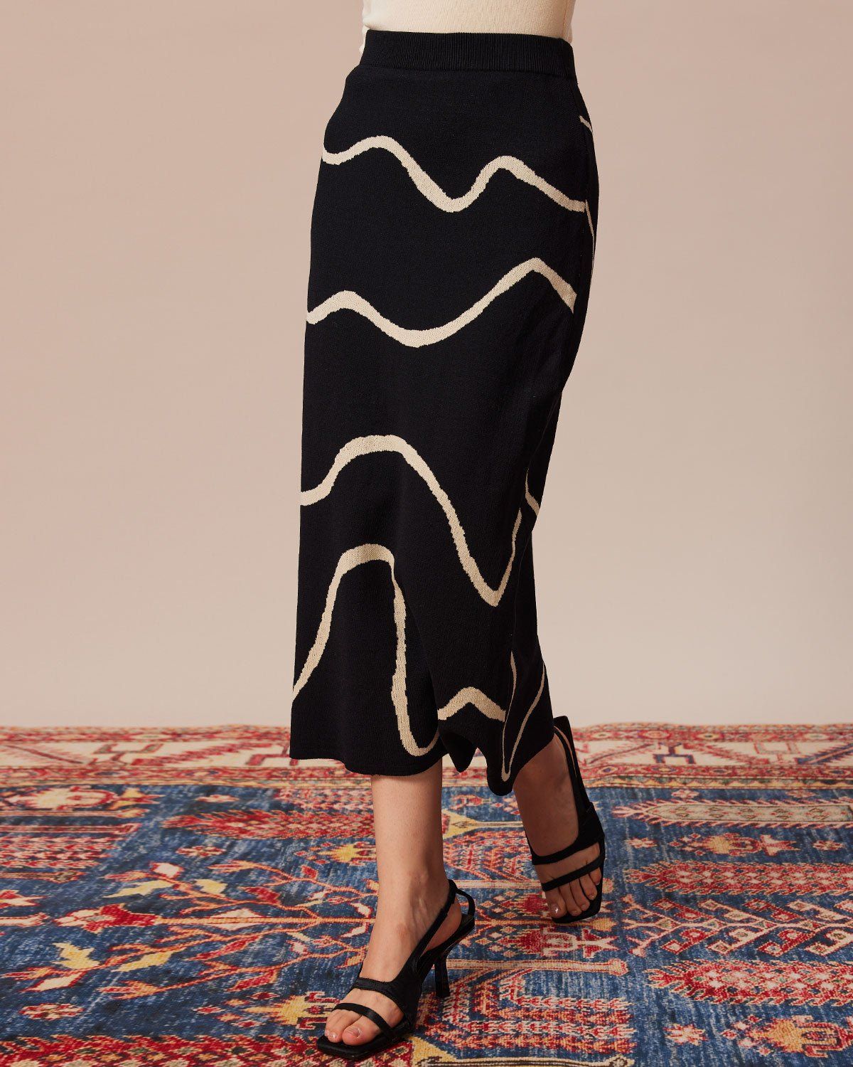 The Black Colorblock Wave Knit Midi Skirt sold by rihoas