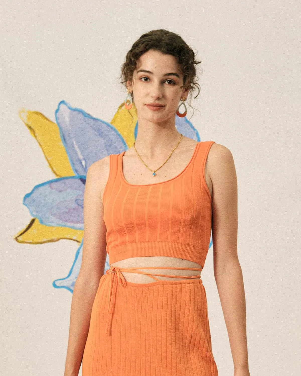 The Solid Color Knit Crop Tank Top sold by rihoas