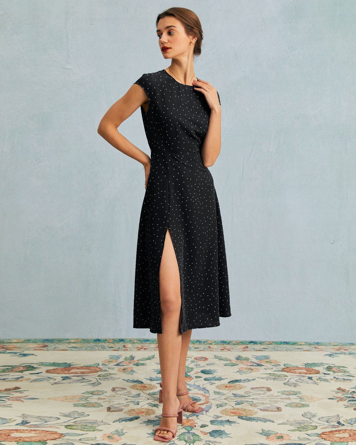 The Black Round Neck Polka Dot Cutout Midi Dress sold by rihoas