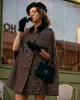 The Double-breasted Plaid Cape Coat sold by rihoas