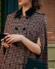 The Double-breasted Plaid Cape Coat sold by rihoas