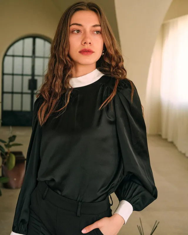 The Color Block Mock Neck Knotted Blouse sold by rihoas