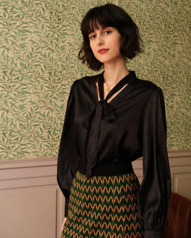The Solid V Neck Knotted Blouse sold by rihoas